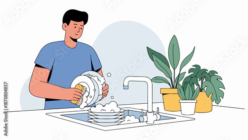 Man washing dishes in a modern kitchen with potted plants on the countertop