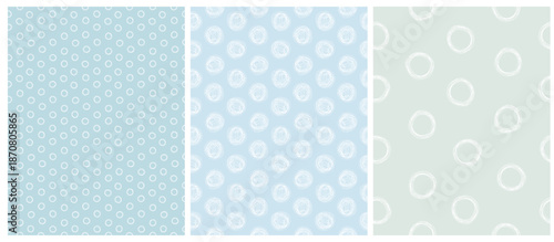 Seamless Irregular Vector Pattern With White Hand Drawn Dots And Circles Isolated on a Pastel Blue Background. Abstract Geometric Repeat Design Ideal For Fabric, Packaging. Childish Style Print.