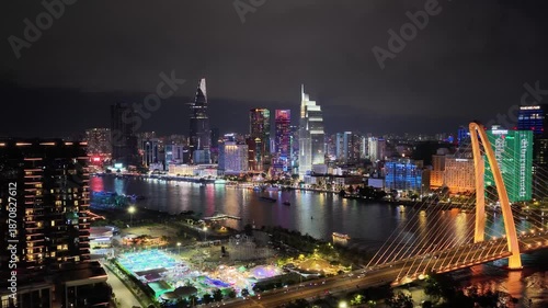 Aerial view of Ba Son Bridge at night in downtown Ho Chi Minh City, connecting District 1 and Thu Duc district
