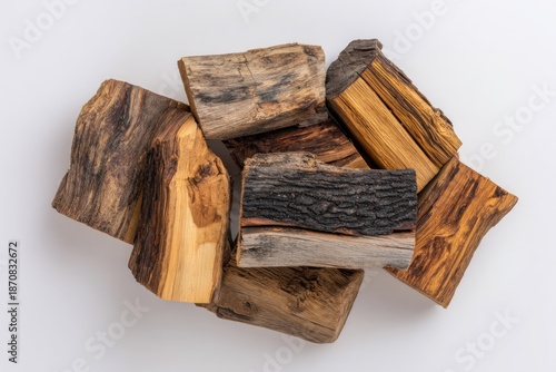 Close up of rustic wood pieces on a neutral white background