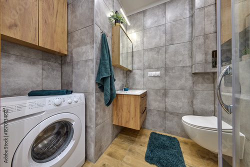 Wallpaper Mural Łazienka w kawalerce z kabiną prysznicową w stonowanych kolorach Torontodigital.ca