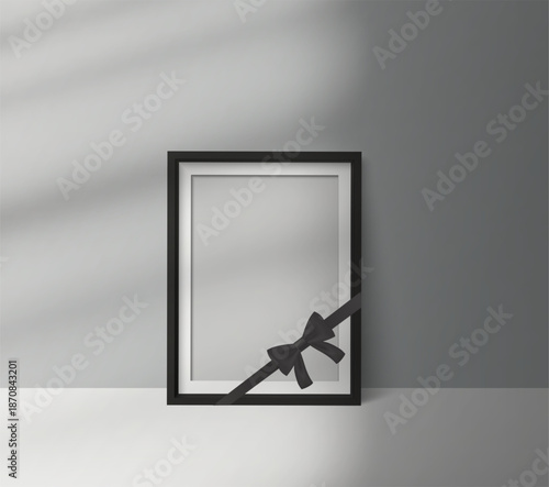 Black mourning frame with ribbon bow standing on the floor, realistic memorial mockup with soft window shadow overlay, perfect for funeral tribute, condolence card, and remembrance design.