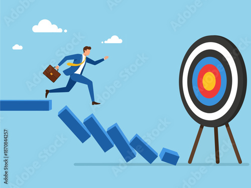 A determined businessman carrying a briefcase leaps from a collapsing path of blue blocks, narrowly escaping failure as he focuses intently on reaching the large target standing firmly ahead
