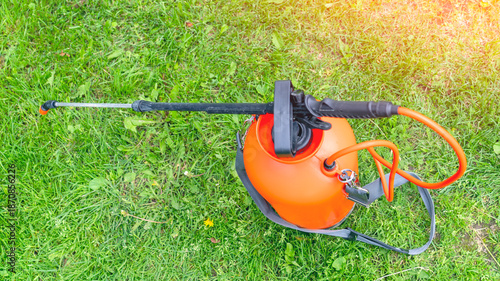 Tableau sur toile Lawn sprayer, lawn care, watering and fertilizing, gardening, landscaping, gardening equipment and tools, country plot or park area
