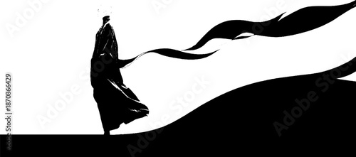 Silhouette of lone figure with flowing cape in abstract black and white scene