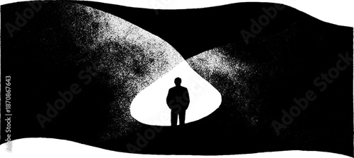 Silhouette of solitary male figure in abstract black and white landscape