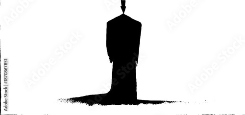 Abstract silhouette of a figure with a tall hat and shadow in monochrome art