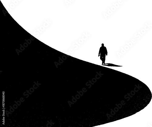 Silhouette of lone person walking on dune in stark black and white contrast