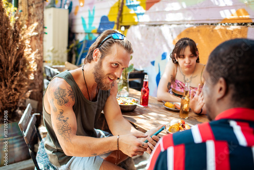 Hostel roommates enjoying outdoor meal