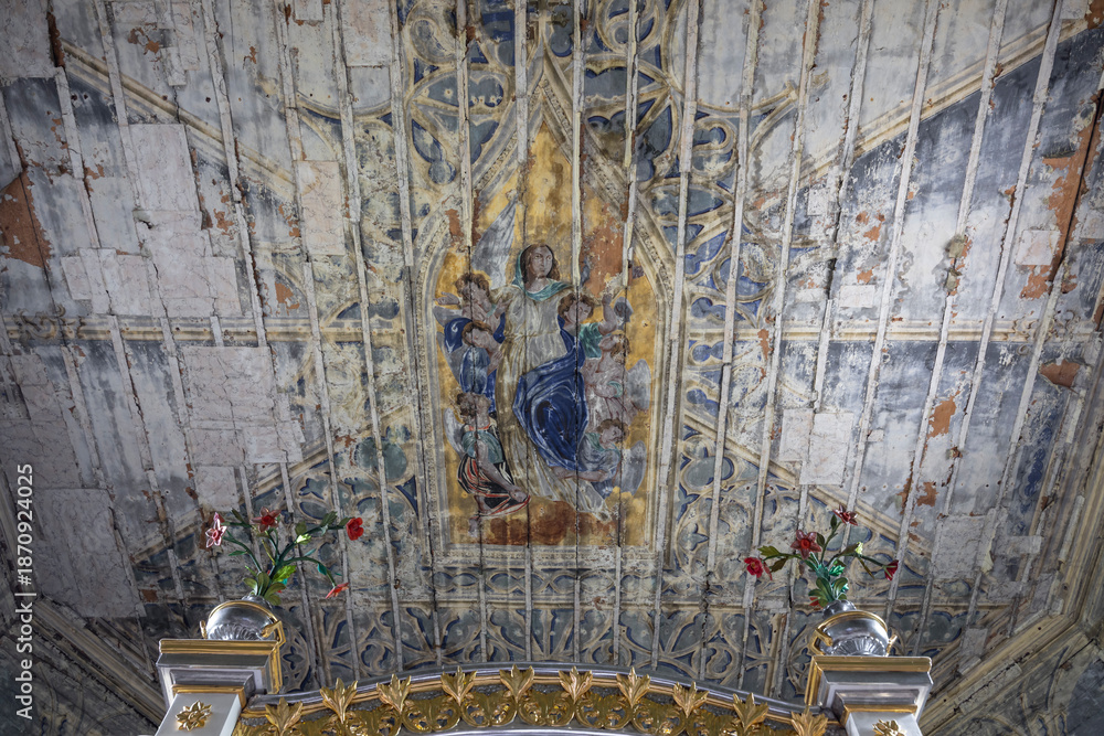 Fototapeta premium Decayed religious ceiling fresco with Madonna and angels