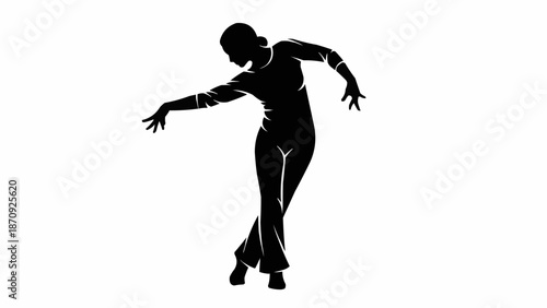 Silhouette of a female dancer performing a graceful ballet pose.