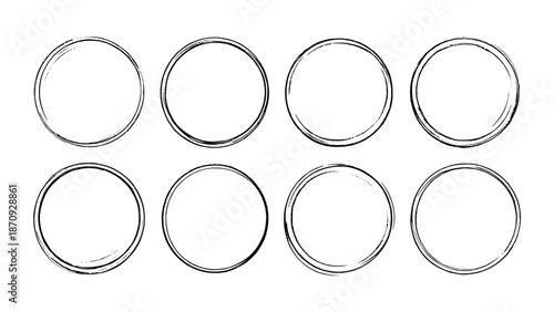 Collection of eight hand-drawn sketchy circles and frames in black ink on a white background, perfect for graphic design elements
