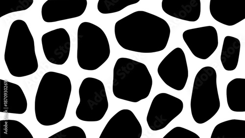 Seamless pattern of irregular black organic shapes on a white background, abstract texture for textiles and design, flat graphic style