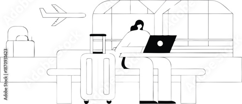 Modern airport terminal with airplane taking off in background at night