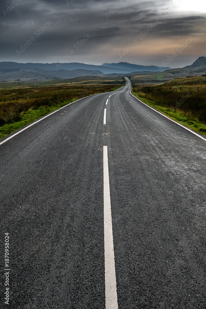Fototapeta premium Abandoned Road Through Spectacular Rural Landscape Of Snowdonia National Park In North Wales, United Kingdom