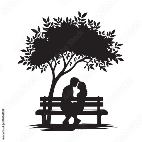 A romantic silhouette of a loving couple embracing under the protective canopy of a tree