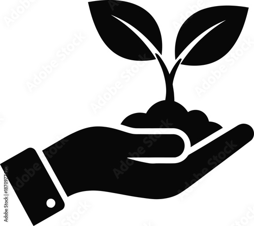 Sustainable growth and nurturing concept with a hand holding a plant