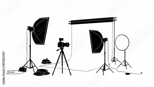 Professional photography studio setup with lighting and camera equipment.