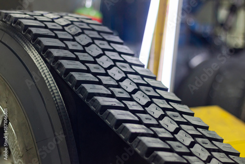 At the tire retreading factory, truck tires with retreaded tread patterns have been given a second life.