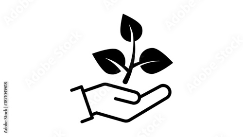 Black silhouette of hand holding plant sprout