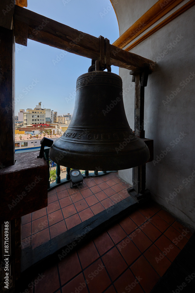 Obraz premium The iconic bells within the belfry of the Convento de Santo Domingo in Lima, a site defined by nearly 500 years of religious and architectural history. 