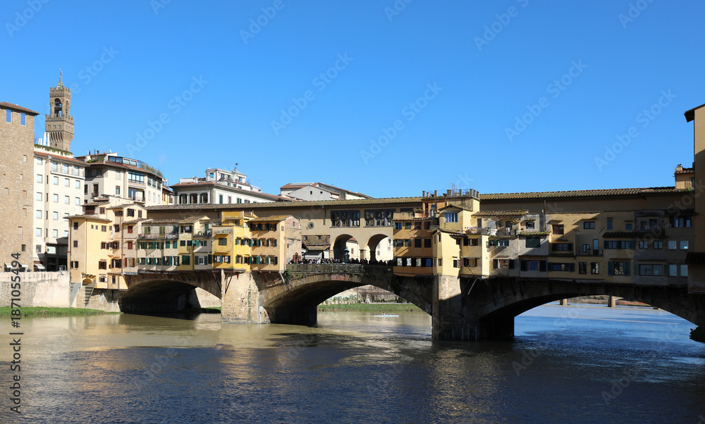 Obraz premium Long bridge called PONTE VECCHIO that means Old Bridge in Florence city in Tuscany Region in Italy