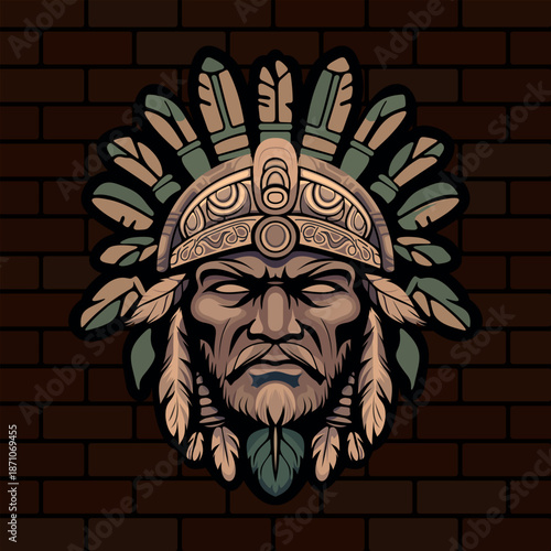 a stern face of a tribal Indian warrior or deity with stylized leaves on his head depicted on a brick wall