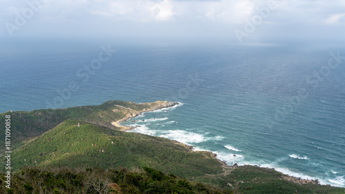 Canvas Print Aerial View of a Windy Bay with Rolling Waves