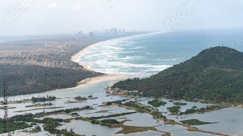 Photos Aerial View of a Windy Bay with Rolling Waves