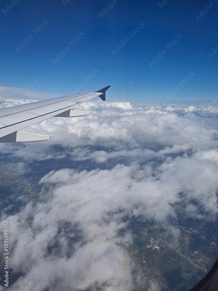 Obraz premium Flying Above Italy – Airplane Window View