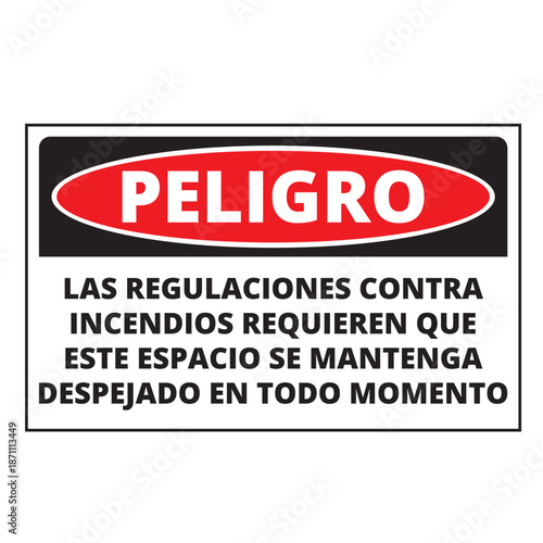 Spanish language danger fire regulations demand that this place be clear at all times sign