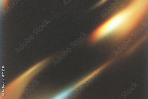light leak overlay effect with scratch dust and blur gold light,retro film texture flare ray lens on black background.abstract background with colorful glowing light,grunge old film burn light