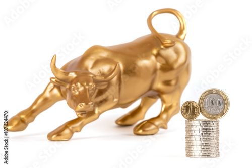 Fotografie A symbol of optimism on the stock exchange, as well as wealth and greed - a gold