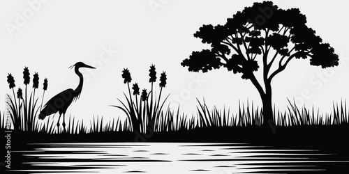 A serene black and white silhouette of a heron by the water s edge
