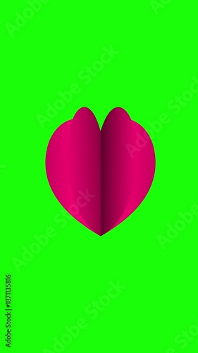 red heart shape moving like a butterfly on a green screen