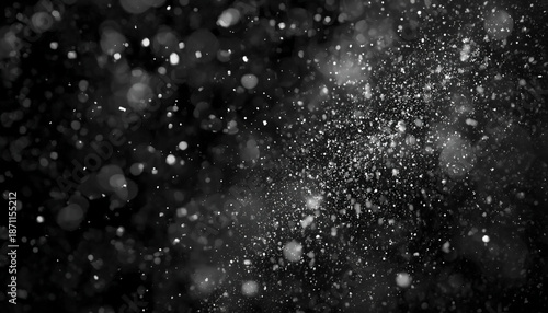 winter snow cold weather A dramatic black and white abstract background with numerous small particles and specks scattered throughout