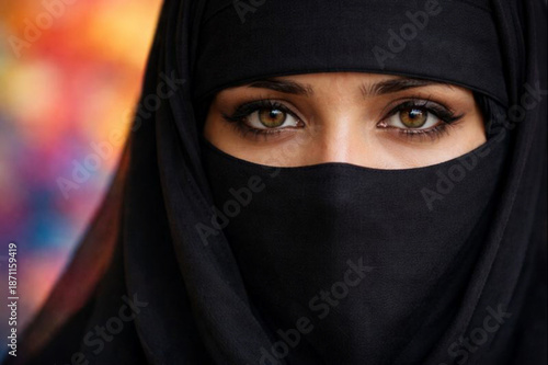 An Iranian Muslim woman in an abaya. Her eyes reflect sadness and bitterness. Female independence, feminism.