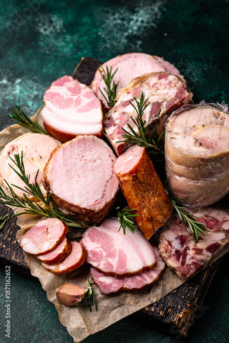 Fotografie Different meat, sausages, ham and smoked pork