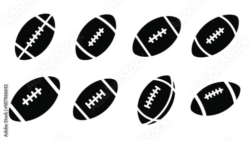 Arrangement of black american footballs in varying orientations silhouette
