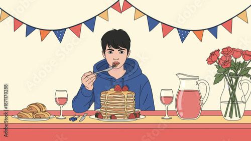 Young man sitting at a decorated table and eating a large stack of delicious pancakes with strawberries at a meal.
