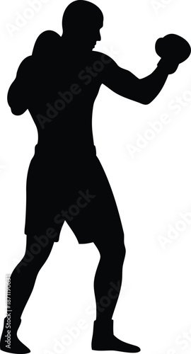 Strong full body silhouette of a male boxer throwing a powerful jab in an active fighting stance