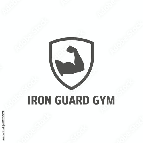 Strong Iron Guard Gym logo featuring a muscular arm inside a shield for fitness branding