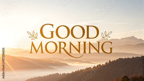 Good morning message over a misty mountain landscape at sunrise