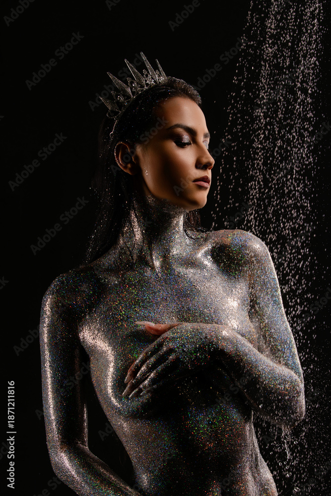 custom made wallpaper toronto digitalRegal woman covered in holographic glitter wearing a crown under falling water drops.