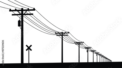 Row of utility poles with power lines stretching into the distance electricity transmission