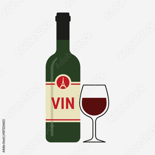 Green bottle of wine next to a glass of red wine.