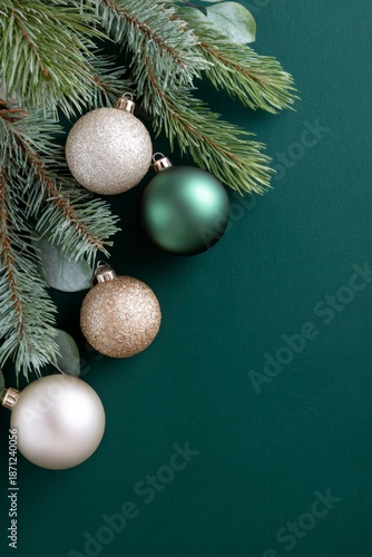 green background with christmas decorations, green and gold color palette, dark green background