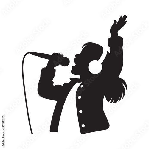 Silhouette of a singer performing with a microphone arms raised in passion