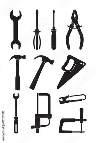 Black silhouettes of various hand tools white wrenches hammers