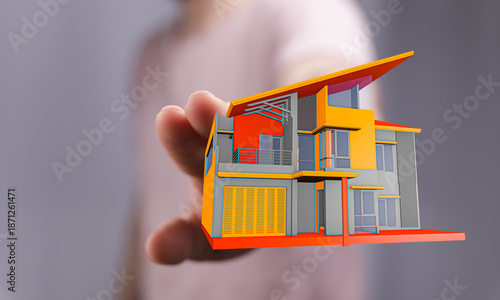Person holding a miniature ...